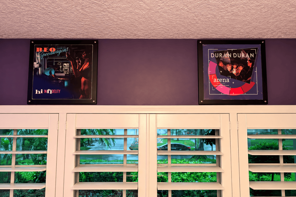 Dan’s first album, REO Speedwagon’s Hi Infidelity, and Wendi’s first album, Duran Duran’s Arena, framed side by side in their music room.