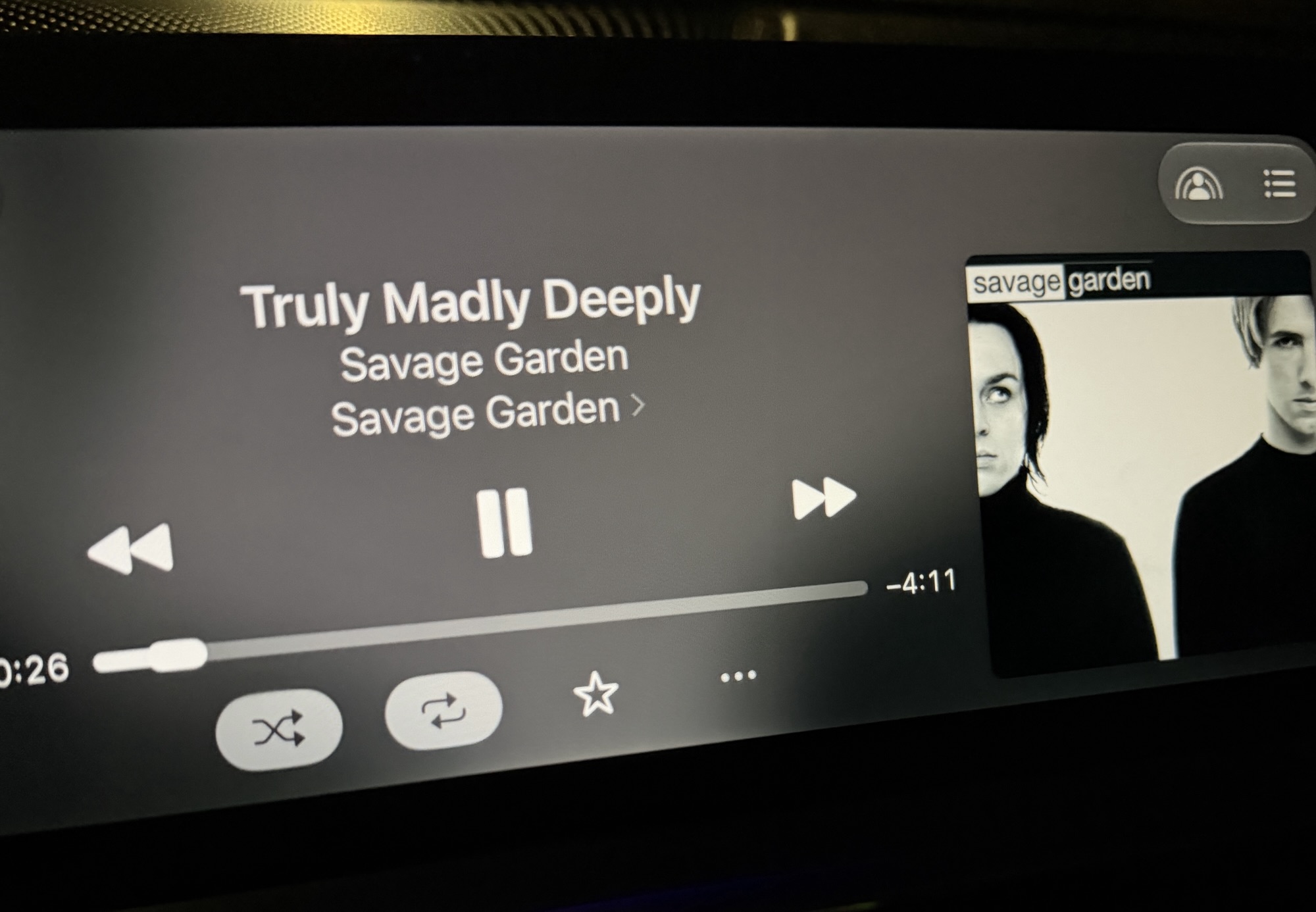 Car music display playing Truly Madly Deeply by Savage Garden, unexpectedly bringing back memories of Israel.